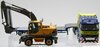 1/50 Volvo FH12-420 Prime Mover with 3-Axle Nooteboom Low Loader Trailer & Excavator "East-West Haulage"